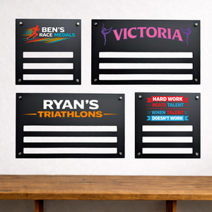 Four personalized medal display boards with names and motivational quotes on a white background.
