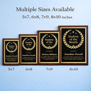 Four framed 'Student of the Month' awards in different sizes on a blue background.