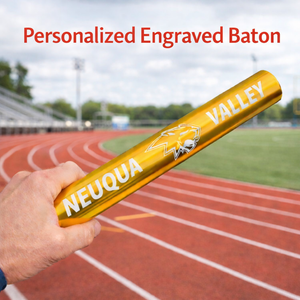 Gold personalized engraved baton held by a person on a track field