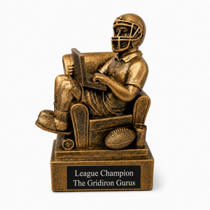 Bronze trophy of a football player reading a book with 'League Champion The Gridiron Gurus' text on a white background.