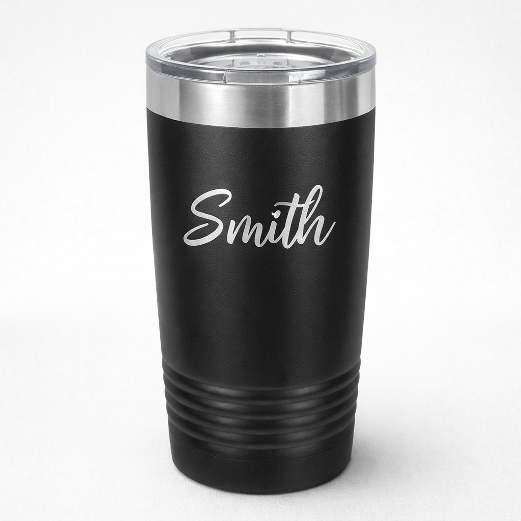Black tumbler with 'Smith' engraving on a white background