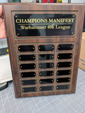 Cherry wooden plaque with engraved names.