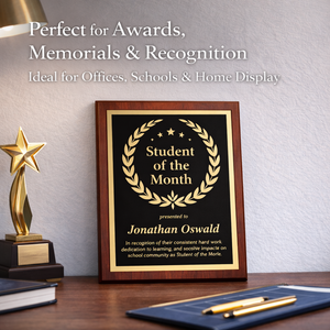 Framed 'Student of the Month' award on a desk with a trophy and pen.