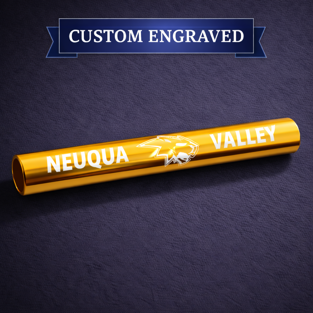 Gold baton custom engraved on a slate background.